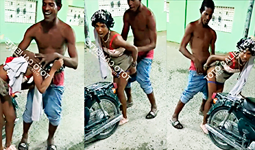 Una dominicana singando con un tipo frente a muchas gente